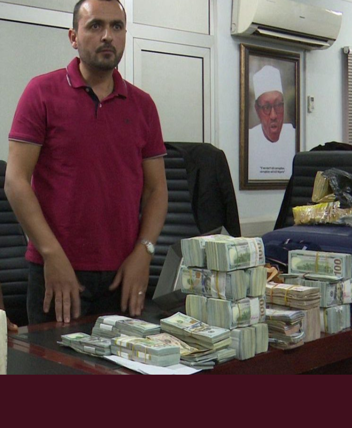 Abbas Lakis with some of the recovered money